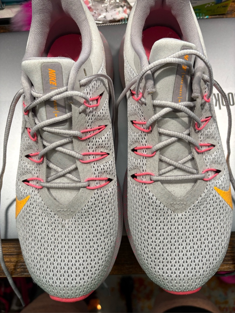 Nike Women’s Light Gray Athletic Sneakers with Pink and Orange Accents